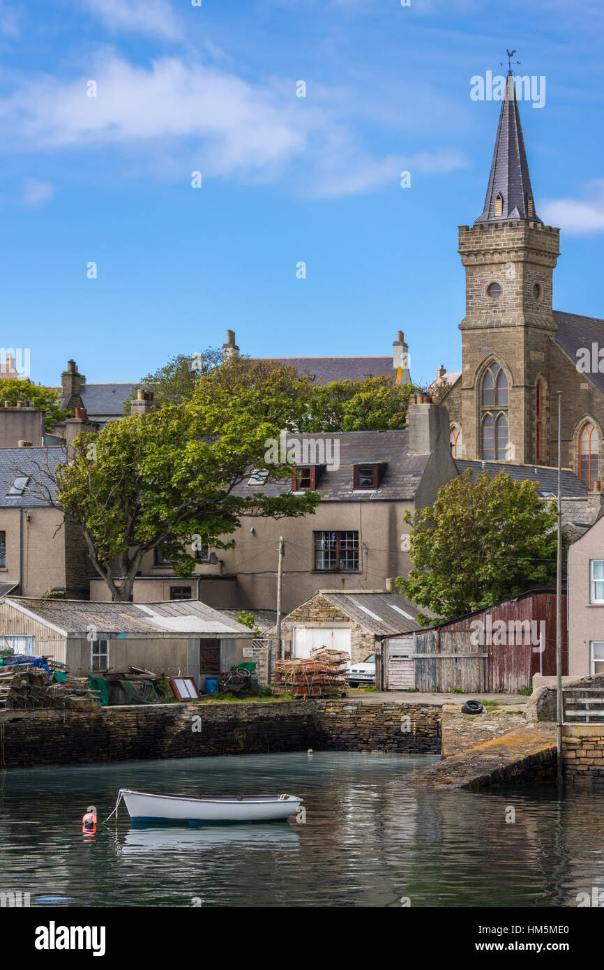 Stromness church and part of the harbor docks. Stock Photo