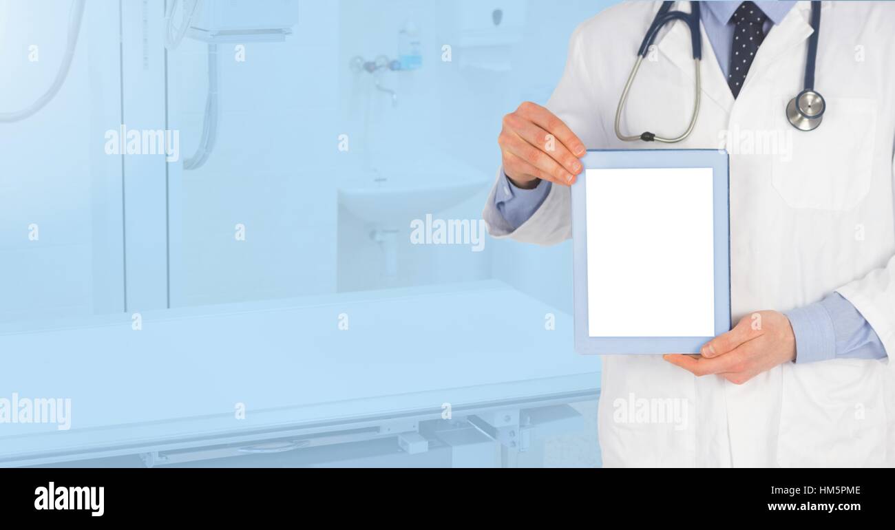 Doctor holding digital tablet Stock Photo - Alamy
