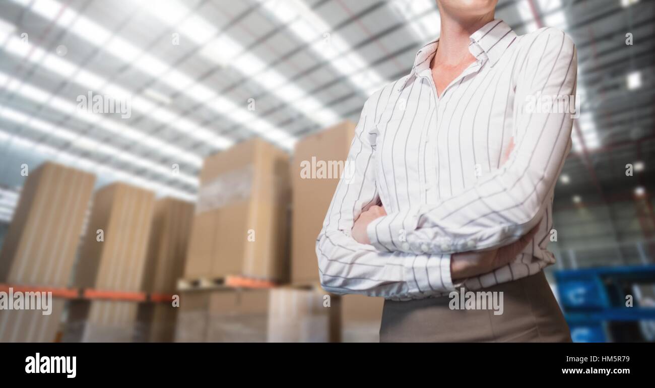 Mid section of businesswoman standing with arms crossed Stock Photo - Alamy