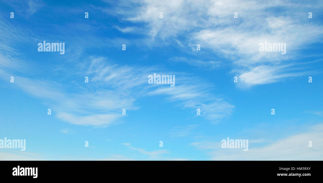 fluffy clouds in the blue sky Stock Photo - Alamy