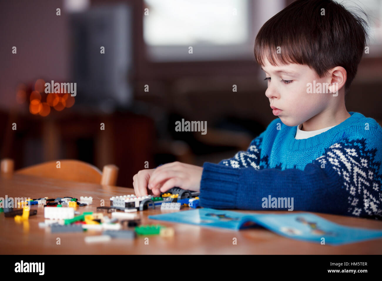 Five years old boy playing with building blocks Stock Photo Alamy