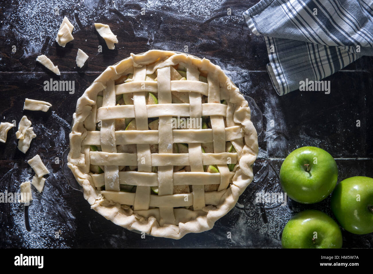 Green apple pie on wooden table Stock Photo