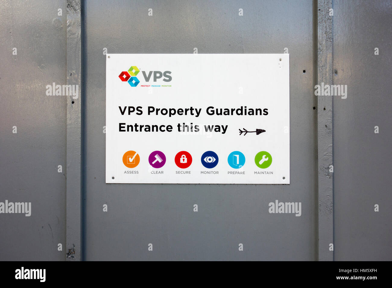 Directional sign for property guardians building entrance, London, UK