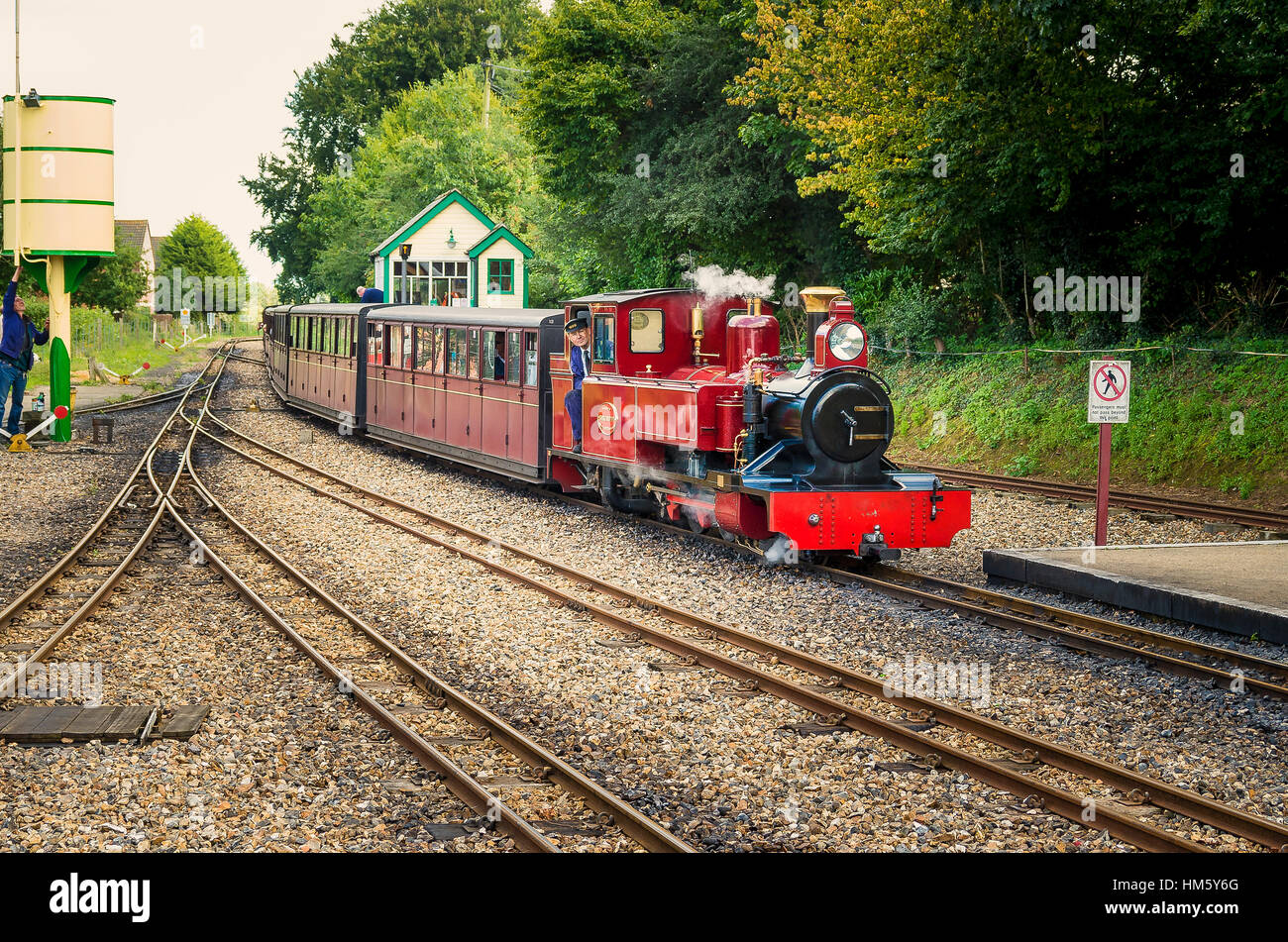 A passenger train arriving at Aylsham station on the Bure Valley Railway in Norfolk UK Stock Photo