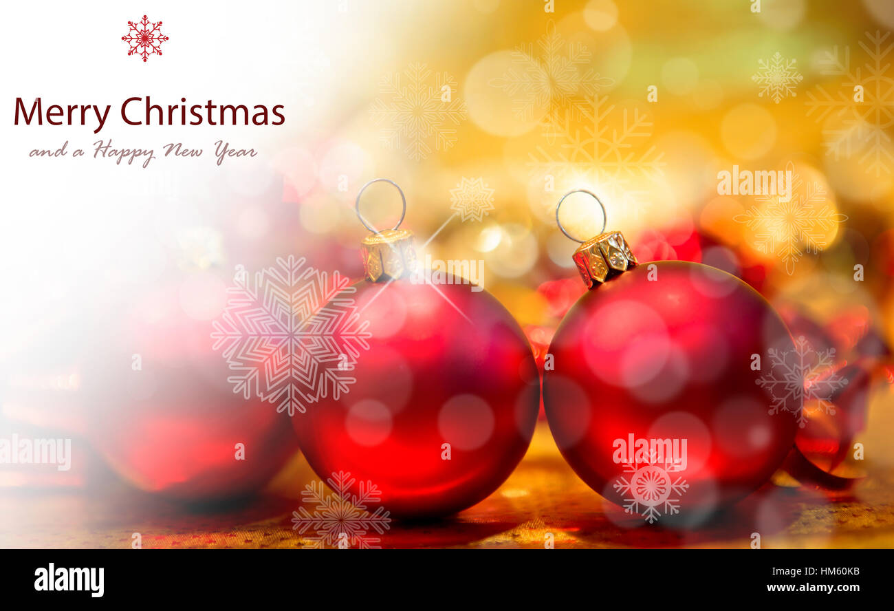 Red Christmas balls on a gold background Stock Photo - Alamy