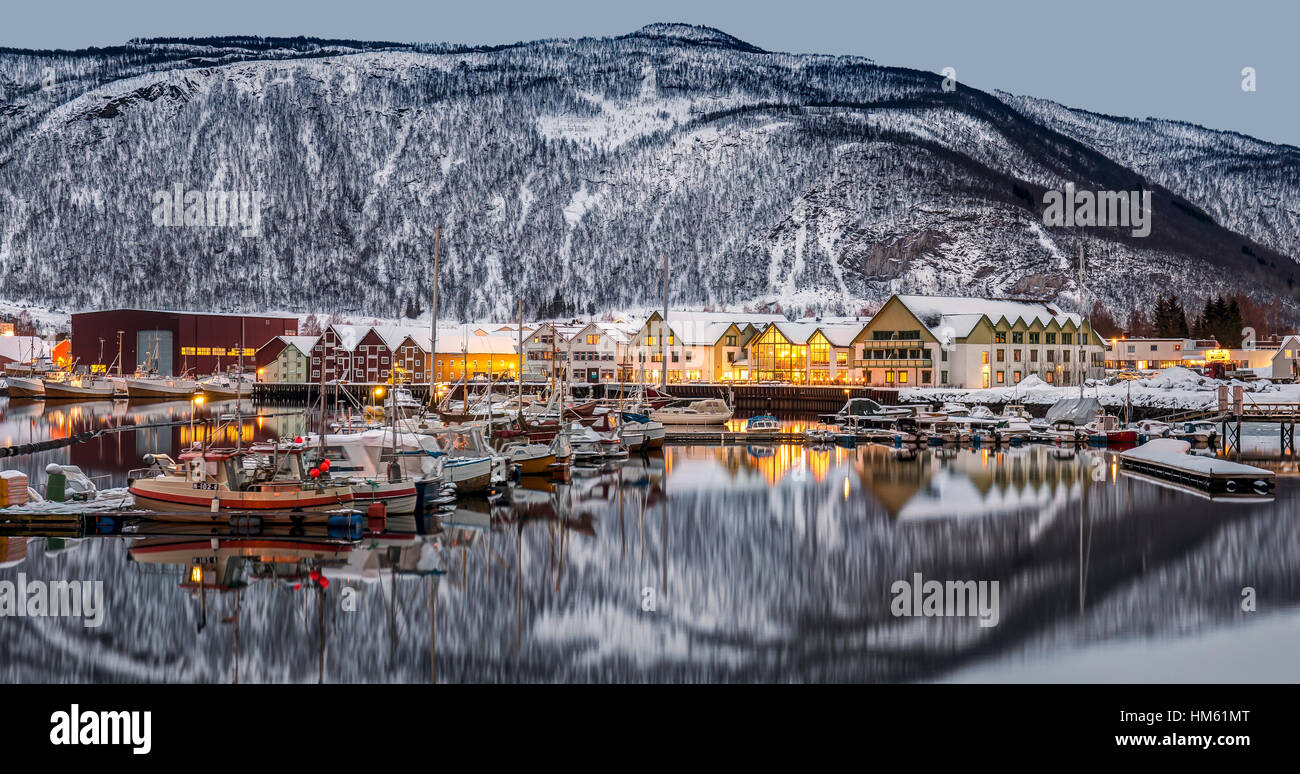 Rognan, a small town in Norway north of the Arctic Circle located on the waterfront by the Saltdalsfjord. Photo is shot in winter. Stock Photo