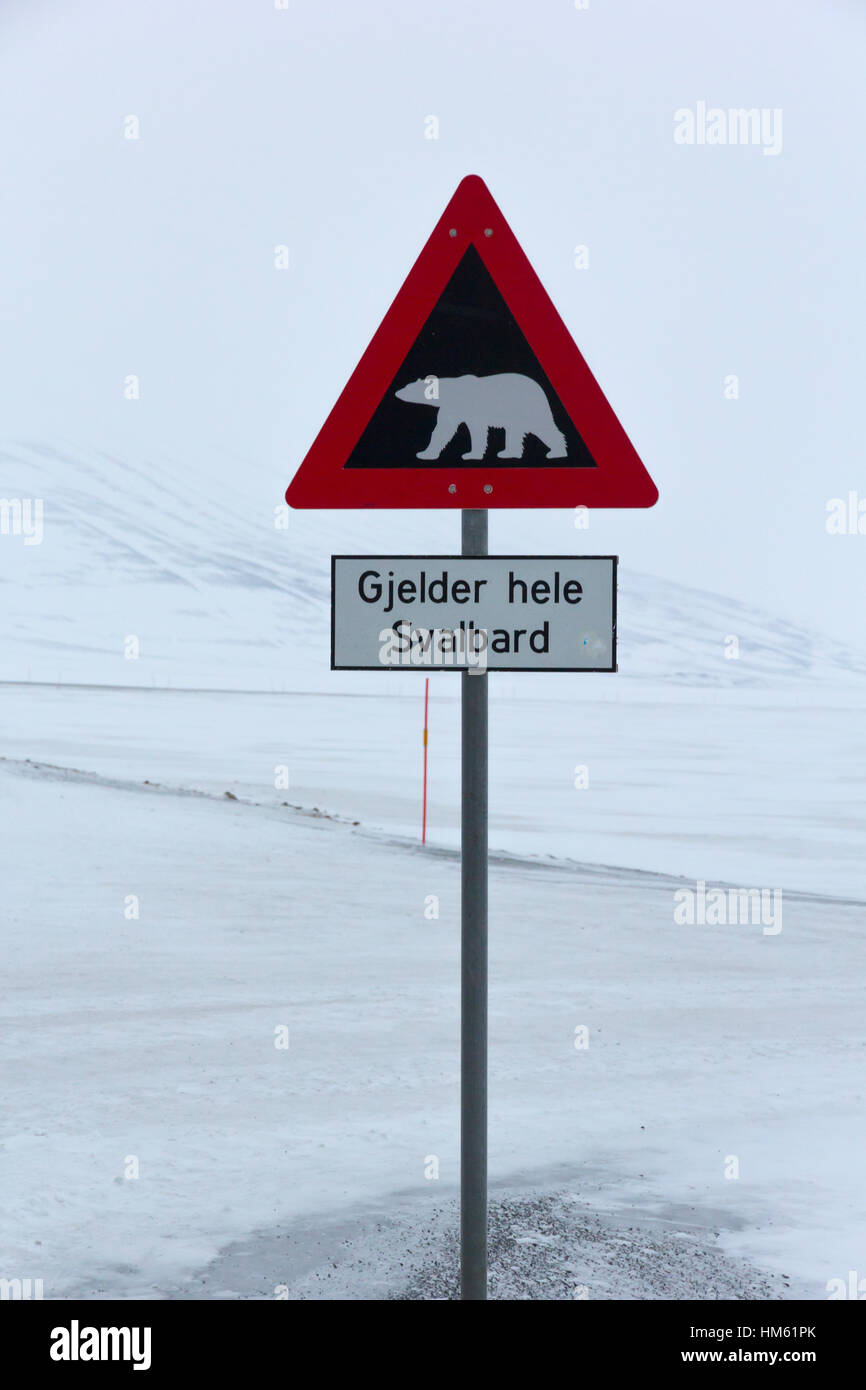 Roadside warning sign for polar bears on the islands of Spitsbergen, Norway. Stock Photo