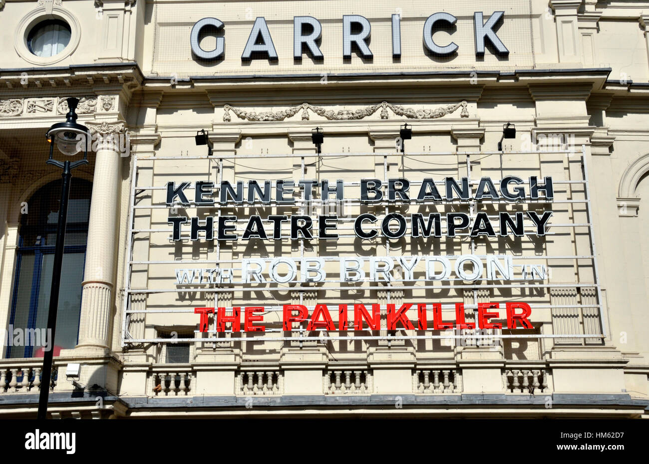 Signs outside the Garrick Theatre promoting the play: ’The Painkiller’ Stock Photo