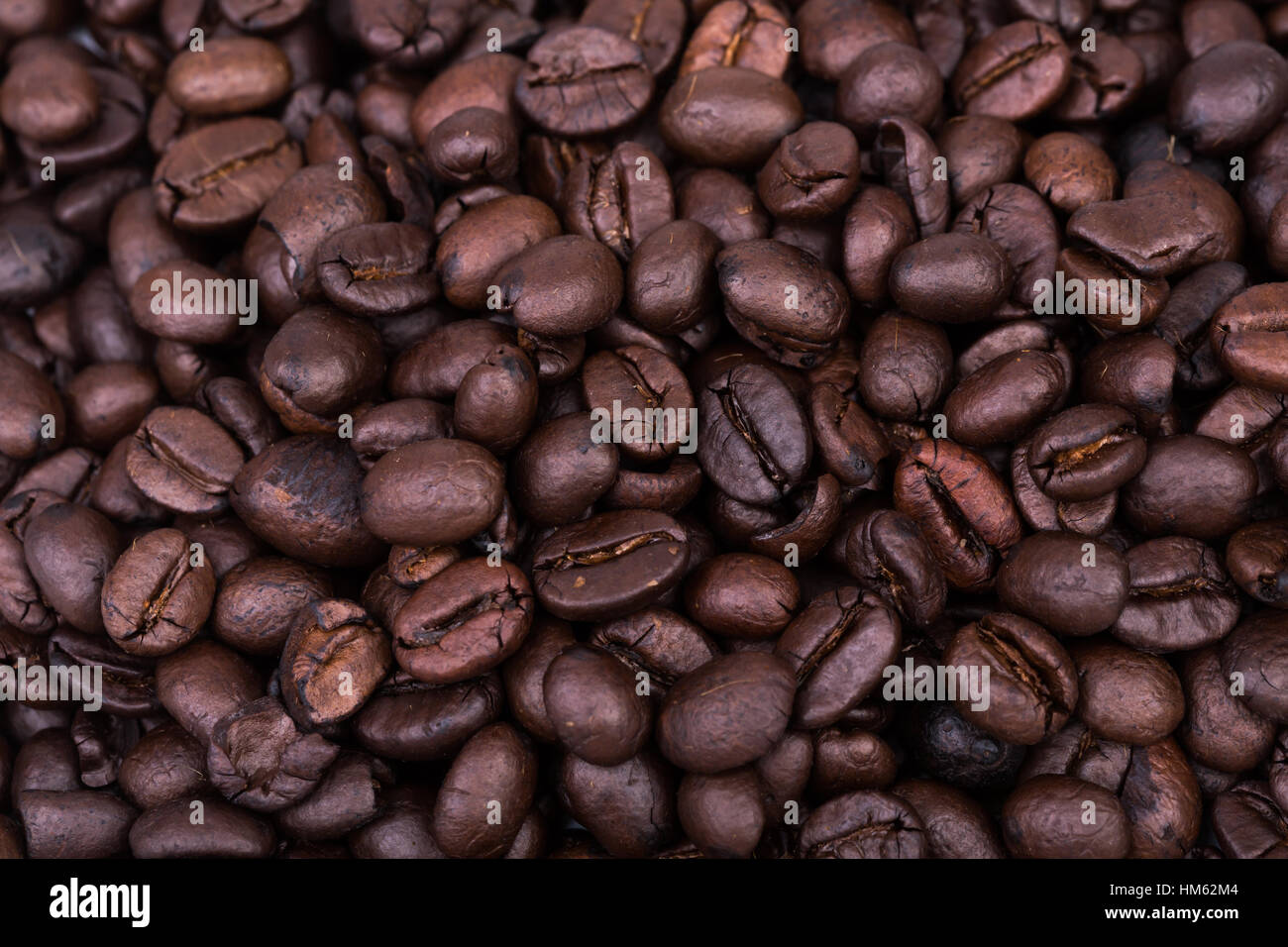 Brown coffee beans background texture Stock Photo - Alamy