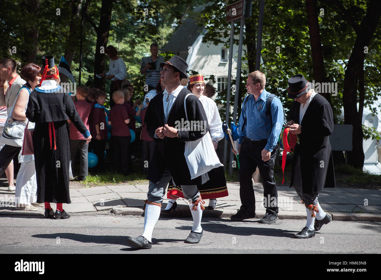 TALLINN, ESTONIA - 04 JUL 2014: People in national Estonian costumes preparing to ceremonial procession of Estonian song and dance festival Stock Photo