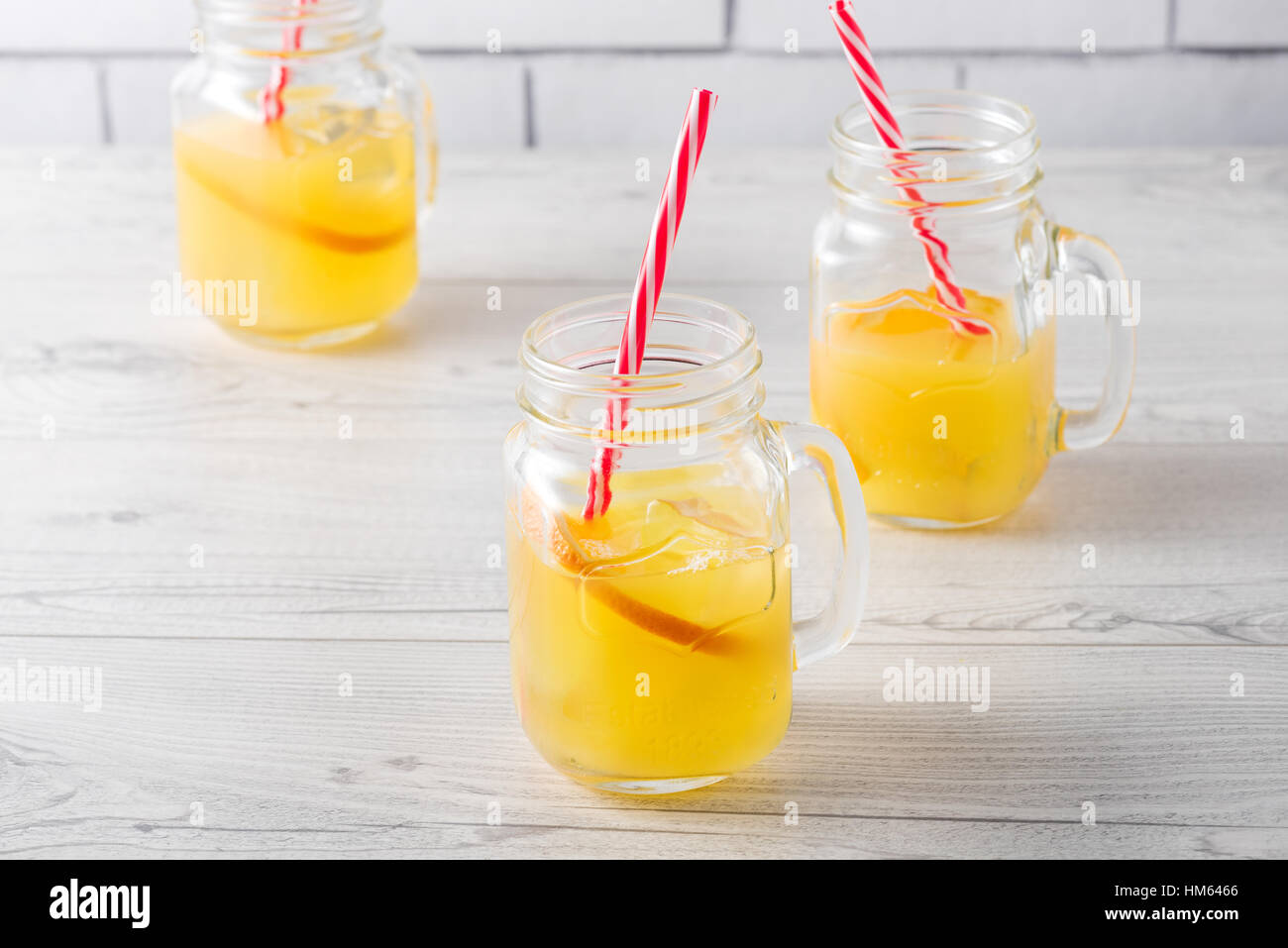 Fresh home made orange screwdriver with garnish Stock Photo Alamy