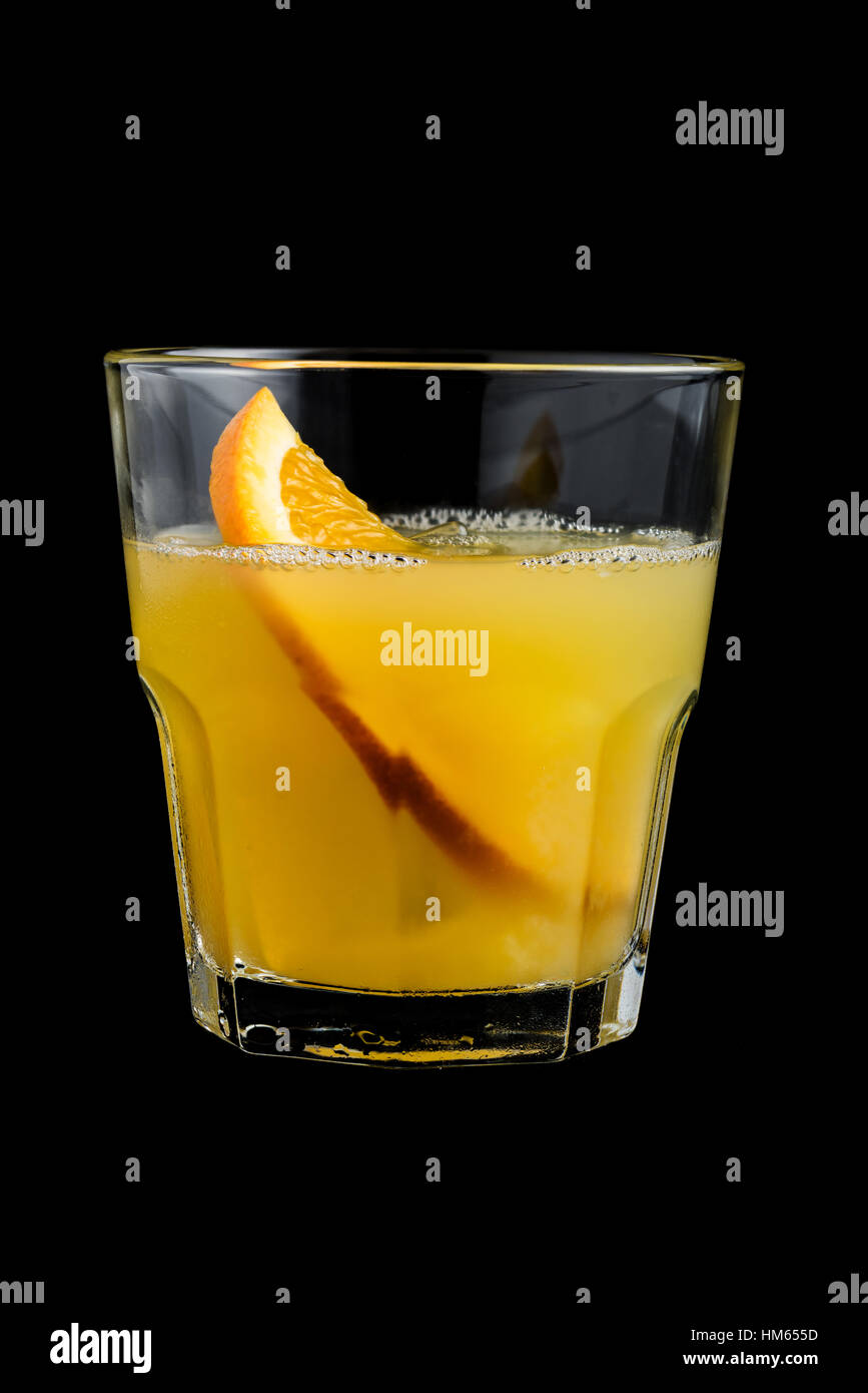 orange screwdriver cocktail with garnish on black background Stock Photo Alamy