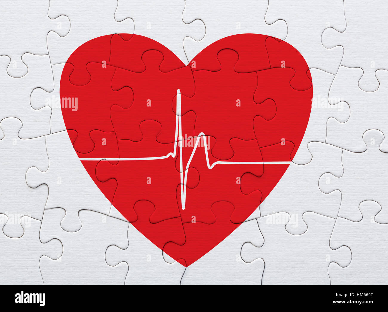 Red heart and pulse trace puzzle Stock Photo