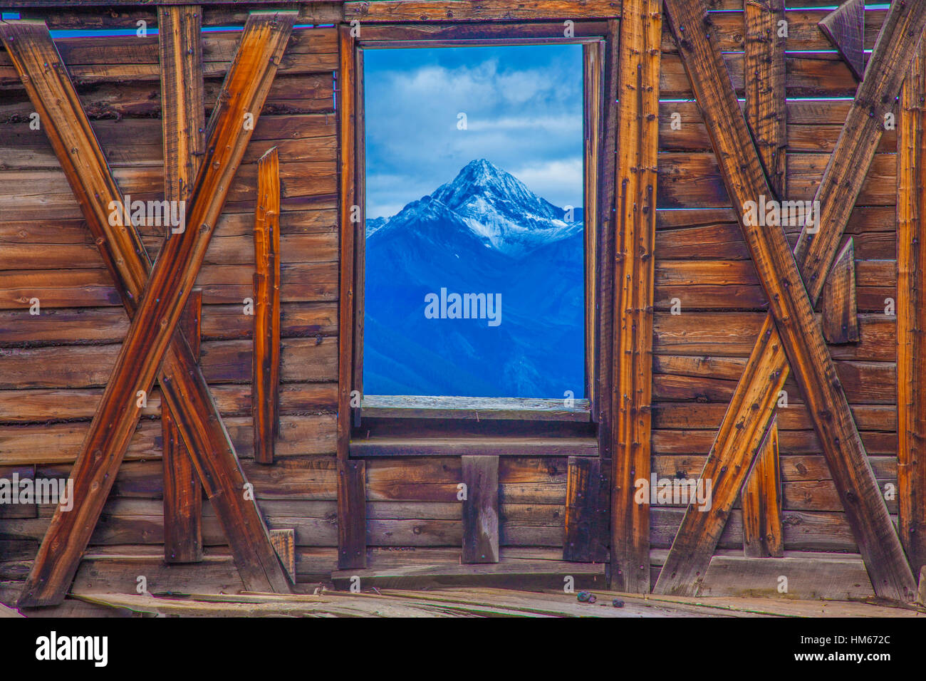 Wilson Peak seen through Alta Ghost Town window, Uncompahgre National Forest, Colorado  San Juan Mountains Stock Photo