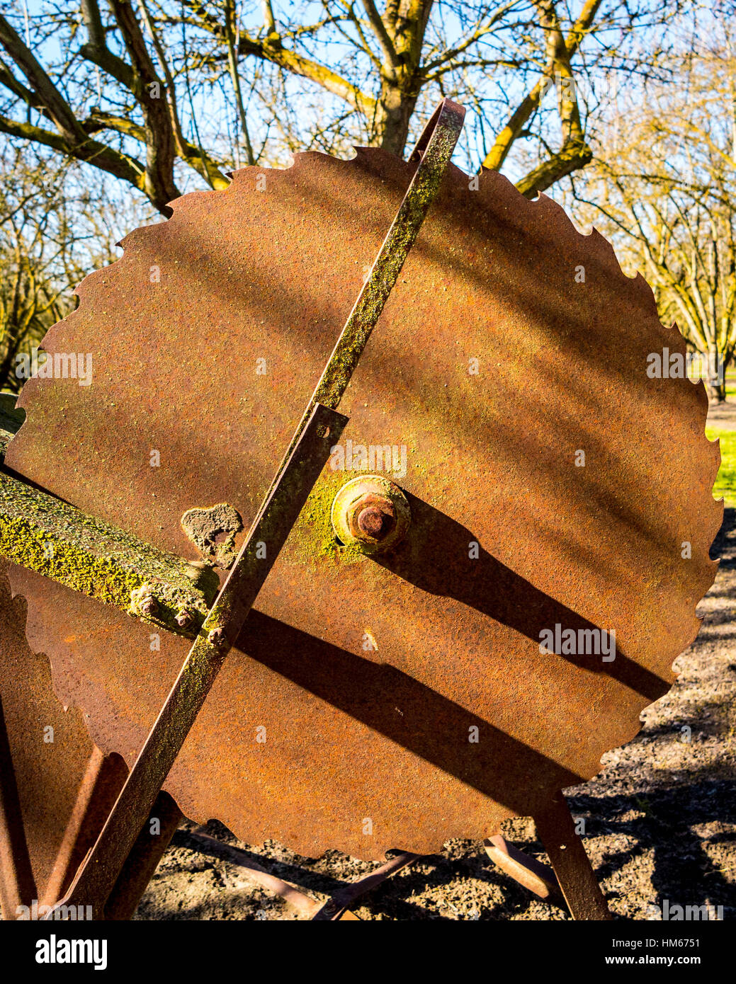 A rusty antique circular saw on a California farm Stock Photo