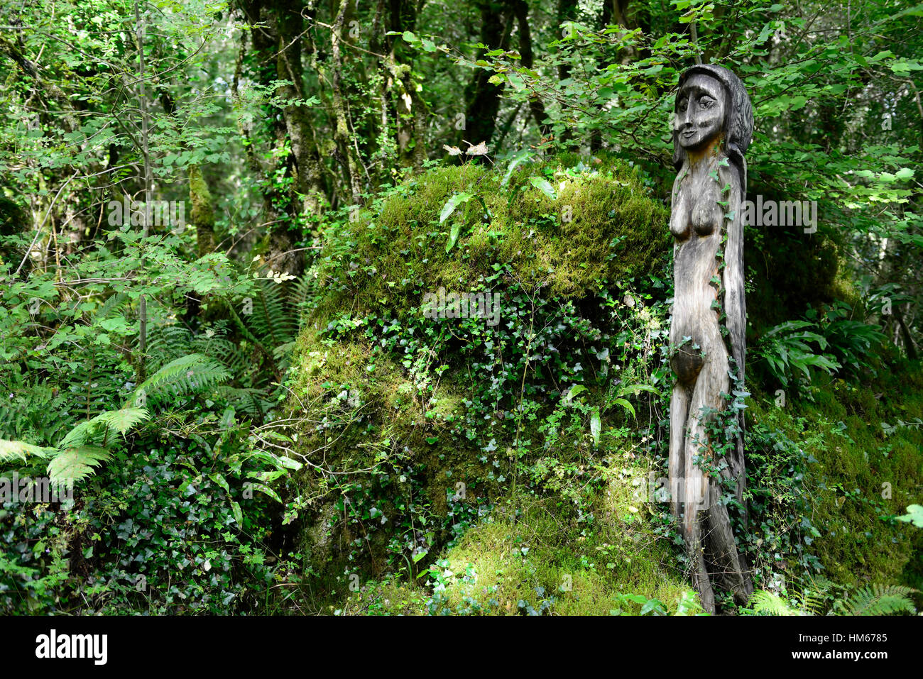 green goddess wood wooden sculpture statue forest installation art