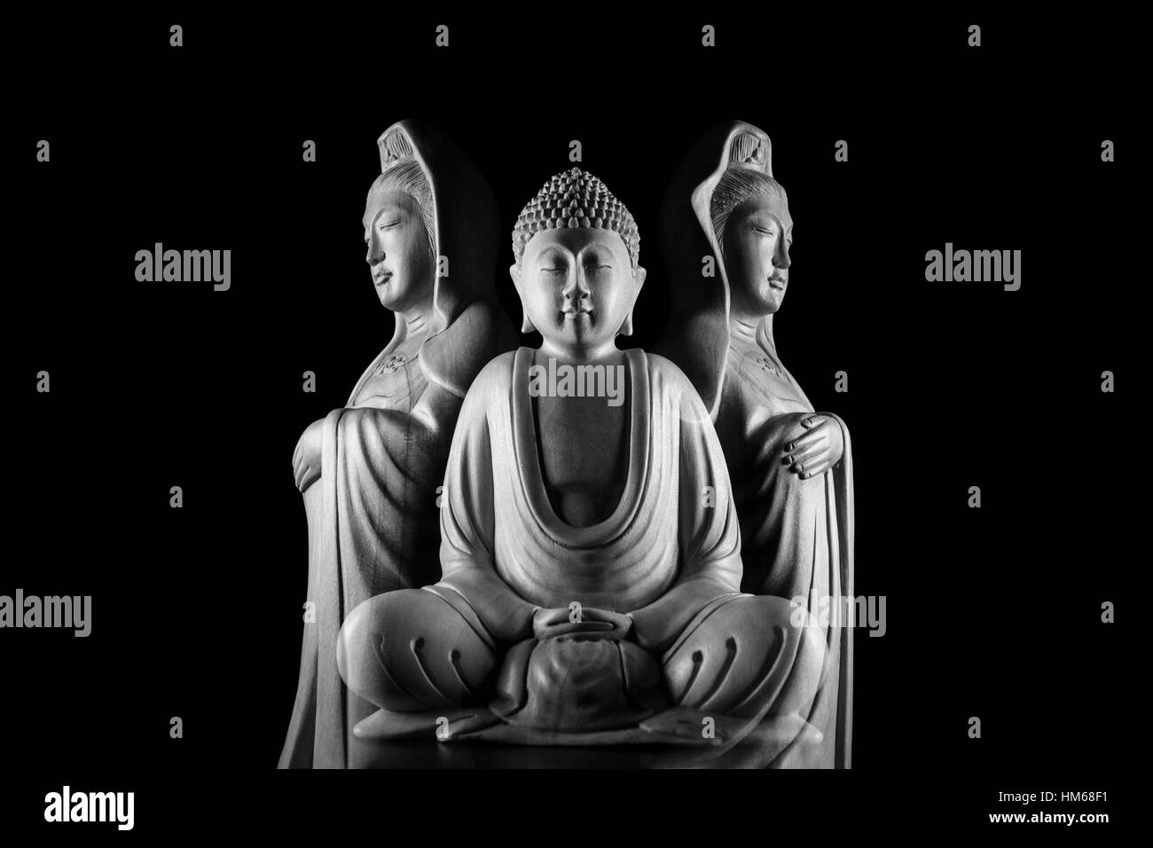 Buddha sculpture 佛/像/佛像 and Avalokitasvara Bodhisattva sculpture 觀音/觀世音/觀自在/菩薩/觀音菩薩/觀世音菩薩/觀自在菩薩/像 Stock Photo