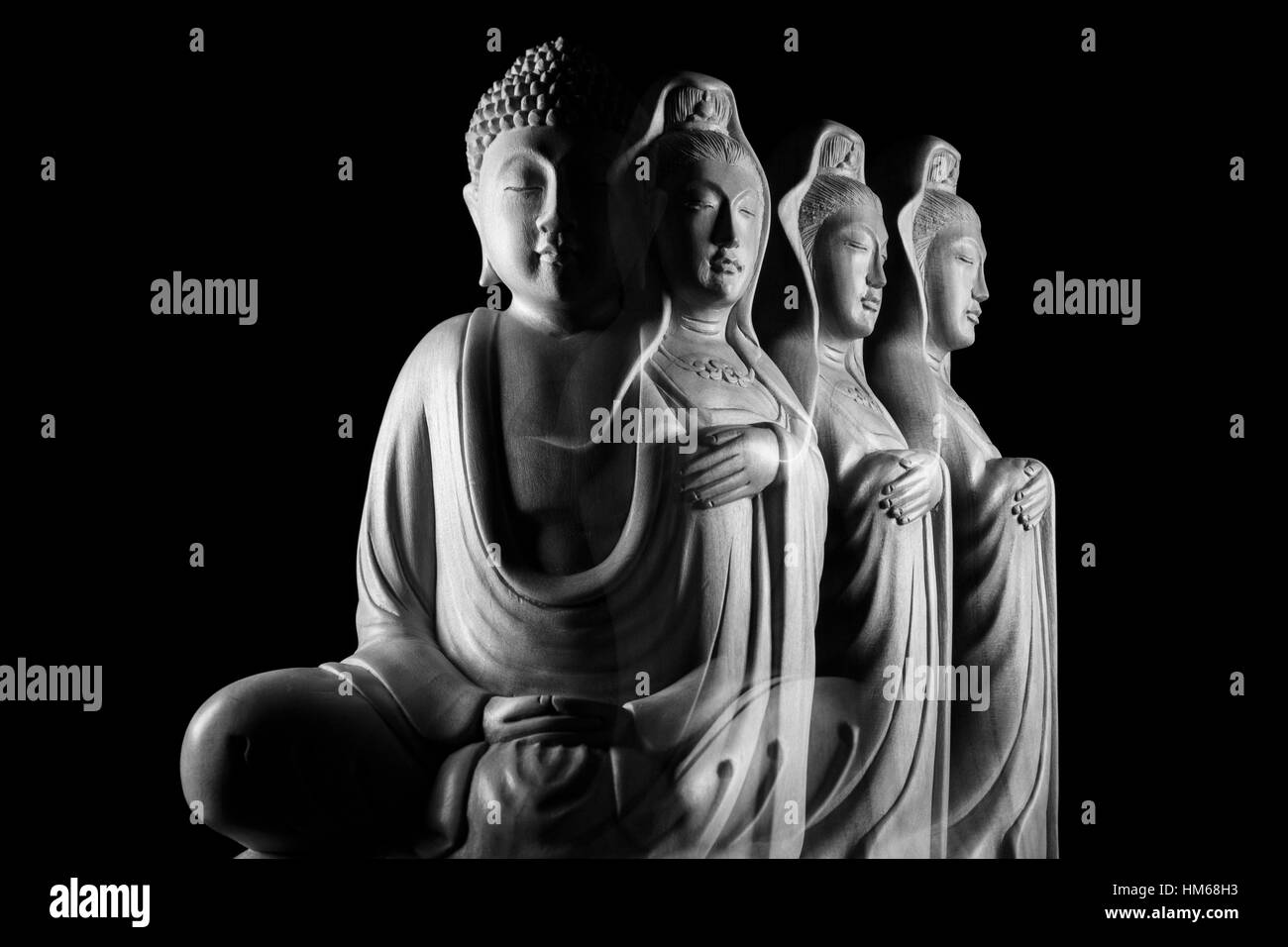 Buddha sculpture 佛/像/佛像 and Avalokitasvara Bodhisattva sculpture 觀音/觀世音/觀自在/菩薩/觀音菩薩/觀世音菩薩/觀自在菩薩/像 Stock Photo