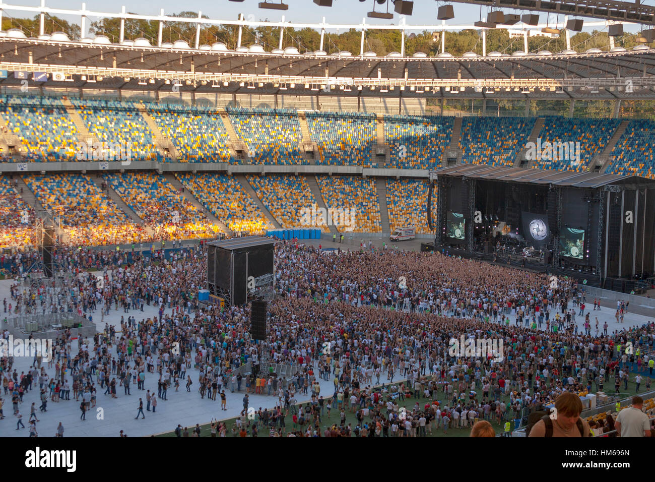 KIEV, UKRAINE - JULY 25: Large group of spectators enjoy Kasabian rock