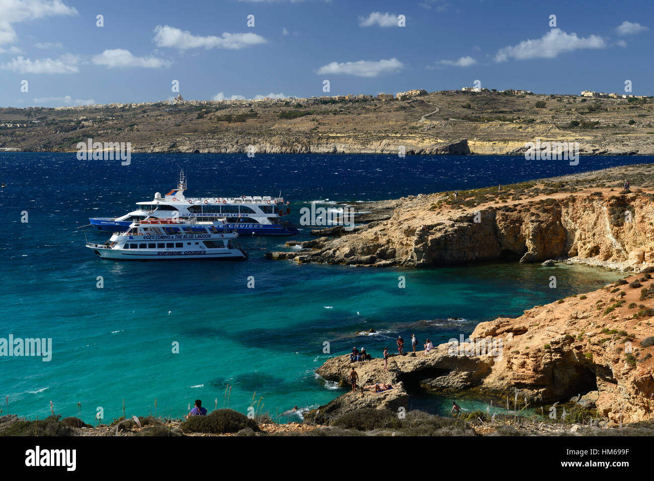The Blue Lagoon Comino Island azure sea seas sky crystal clear water waters Mediterranean ocean tourism Malta RM World Stock Photo