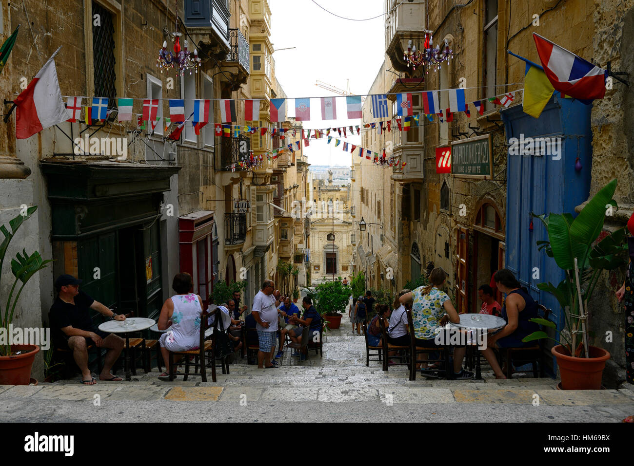 cafe cafes restaurant restaurants outdoors outdoor eat eating street streets Valletta culture Malta food bar bars RM World Stock Photo