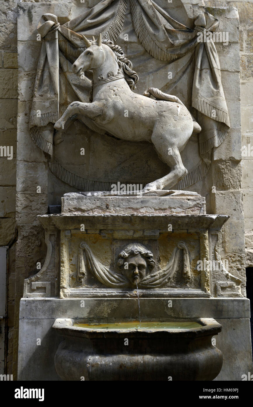 unicorn fountain water feature fountain fountains statue stone sculpture mythological creature valletta malta RM World Stock Photo