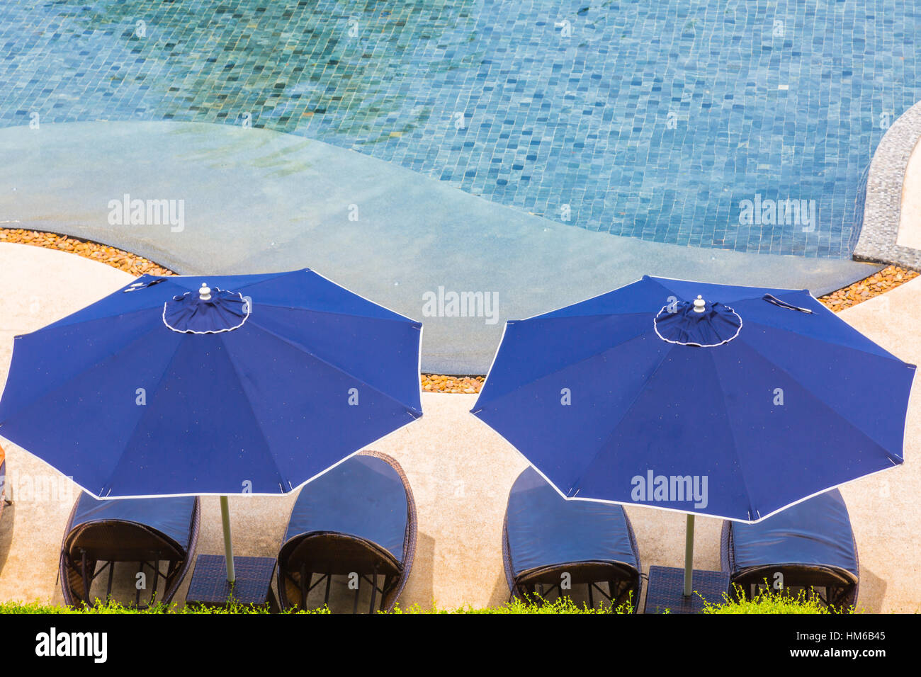 Swimming pool with relaxing seats Stock Photo Alamy