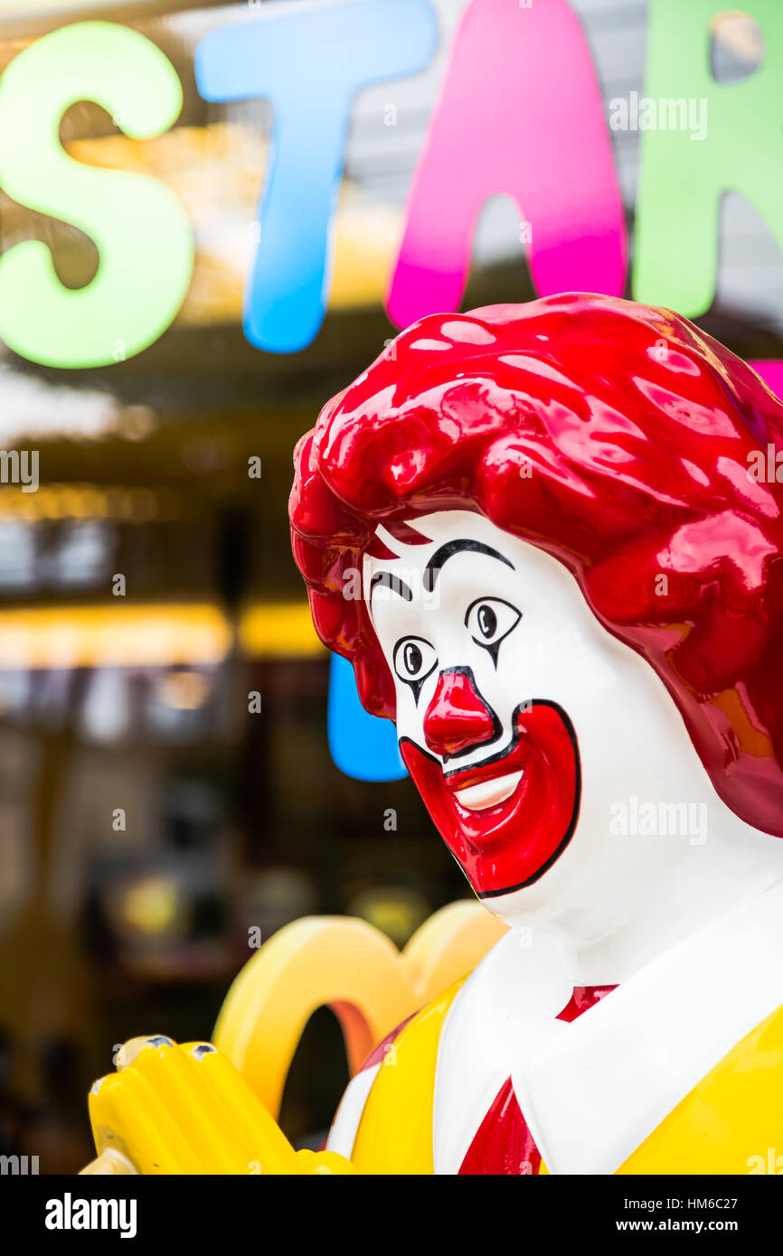 KRABI, THAILAND - July 18, 2015: View of Ronald McDonald in front of a McDonald's  on July 18, 2015 in Krabi, Thailand. McDonald's operates in 119 cou Stock Photo