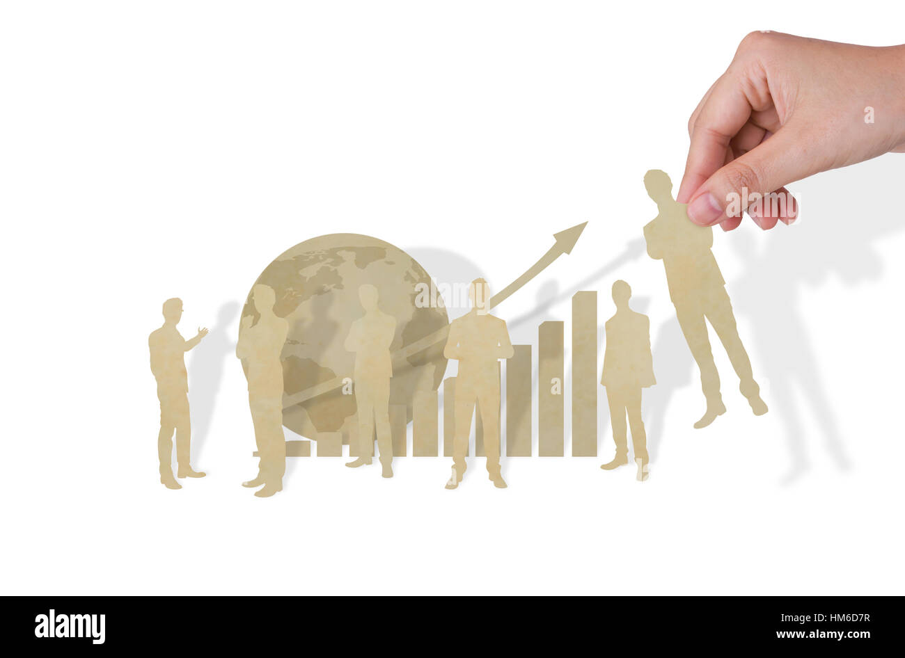 Hand pick paper cut of business man Stock Photo - Alamy