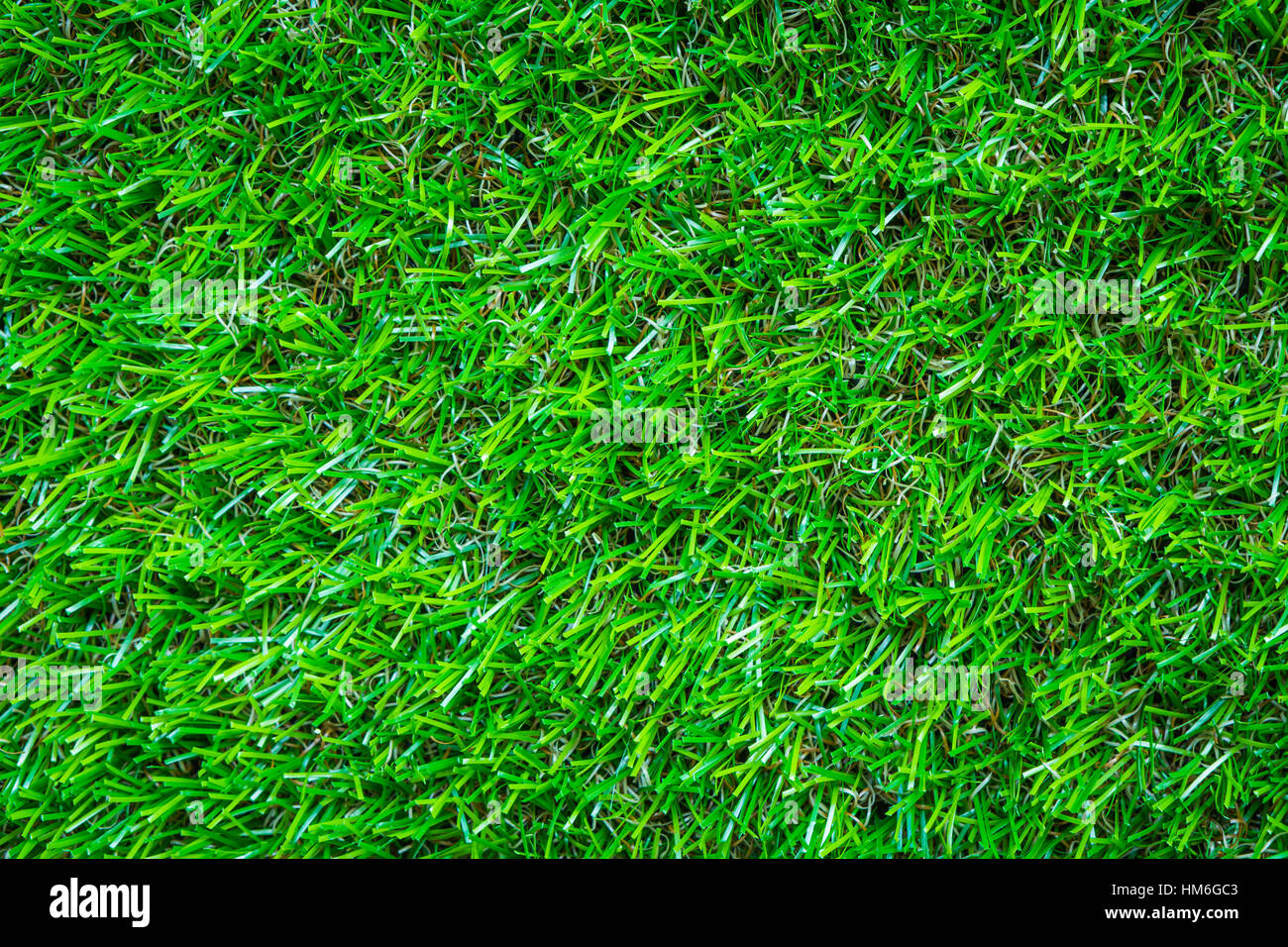 Artificial green grass background texture Stock Photo - Alamy
