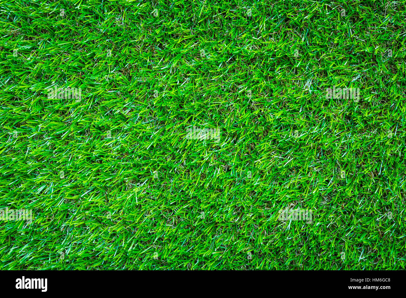 Artificial green grass background texture Stock Photo - Alamy