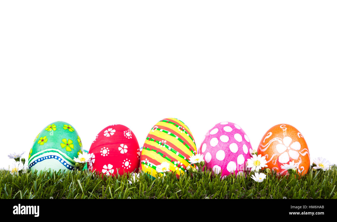 Easter Eggs on Fresh Green Grass over white background Stock Photo - Alamy