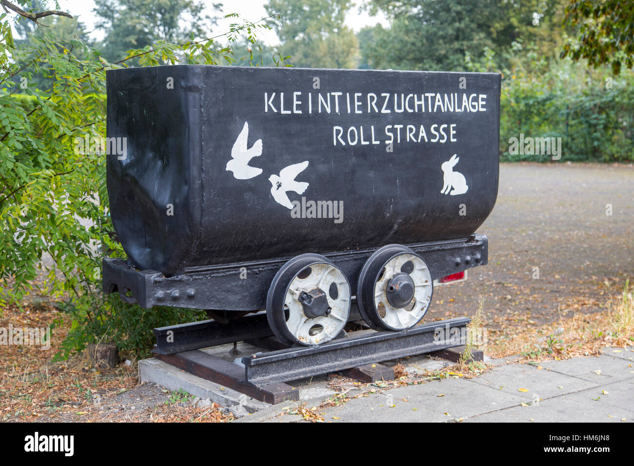 Coal lorry, used in coal mining, for carrying coal and rocks to the surface, today a historic memory, souvenir, after the coal mines were closed,  in  Stock Photo