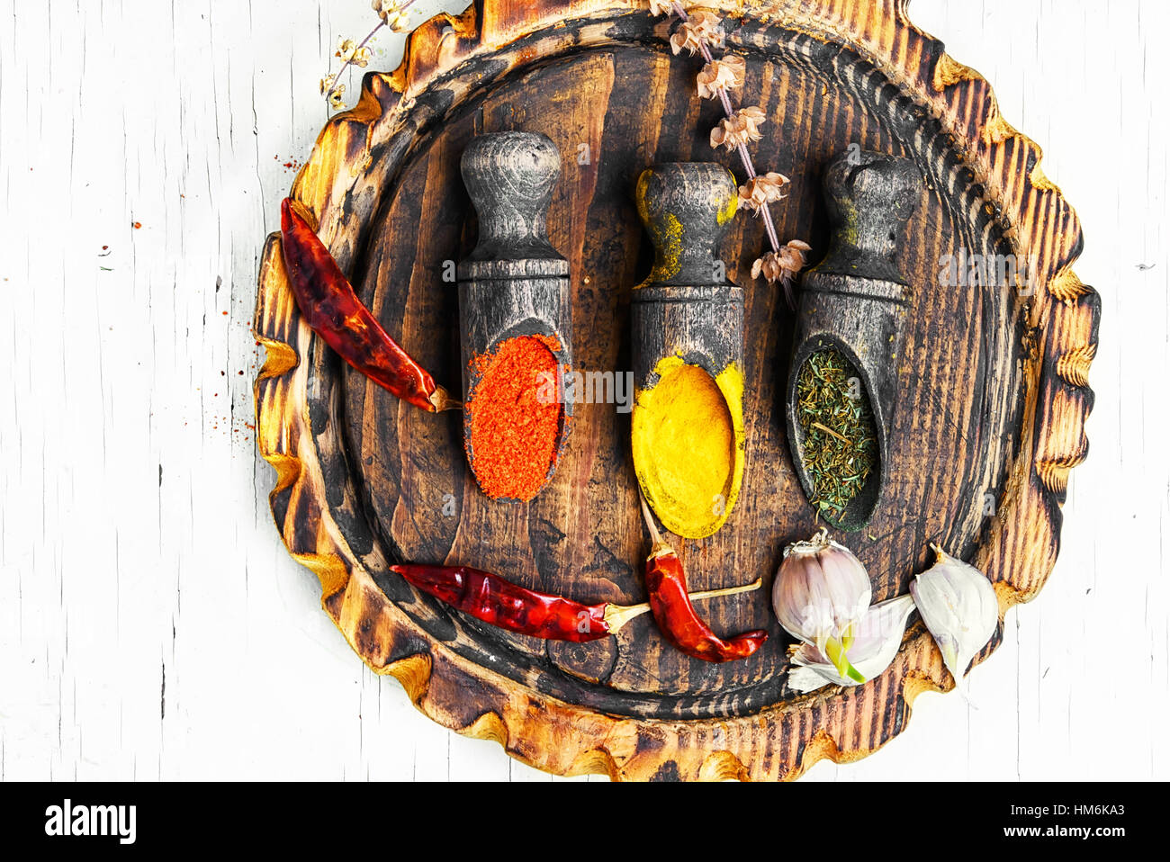 large mix of spicy spices in spoons on white background Stock Photo