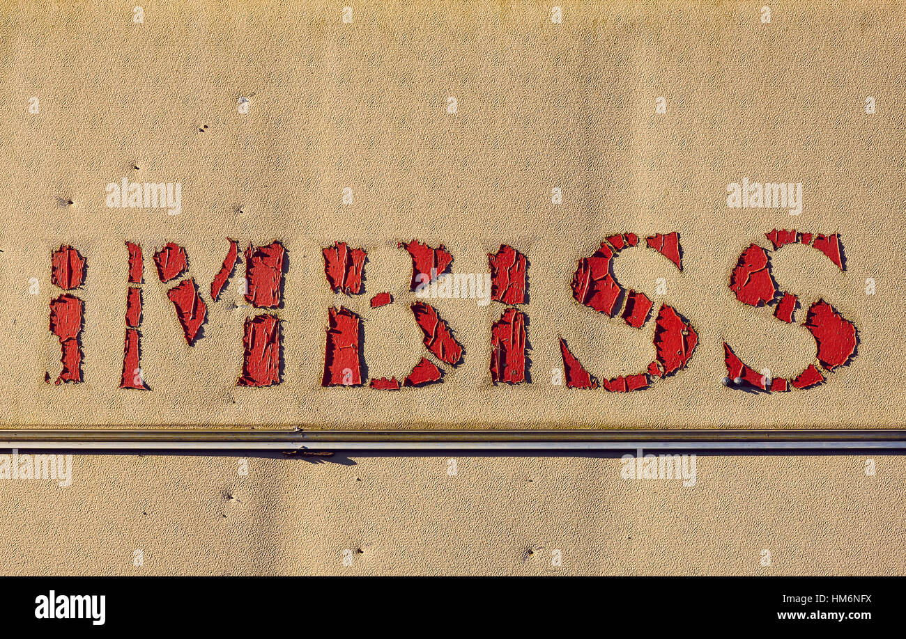 The word 'Imbiss', red letters on a beige background Stock Photo