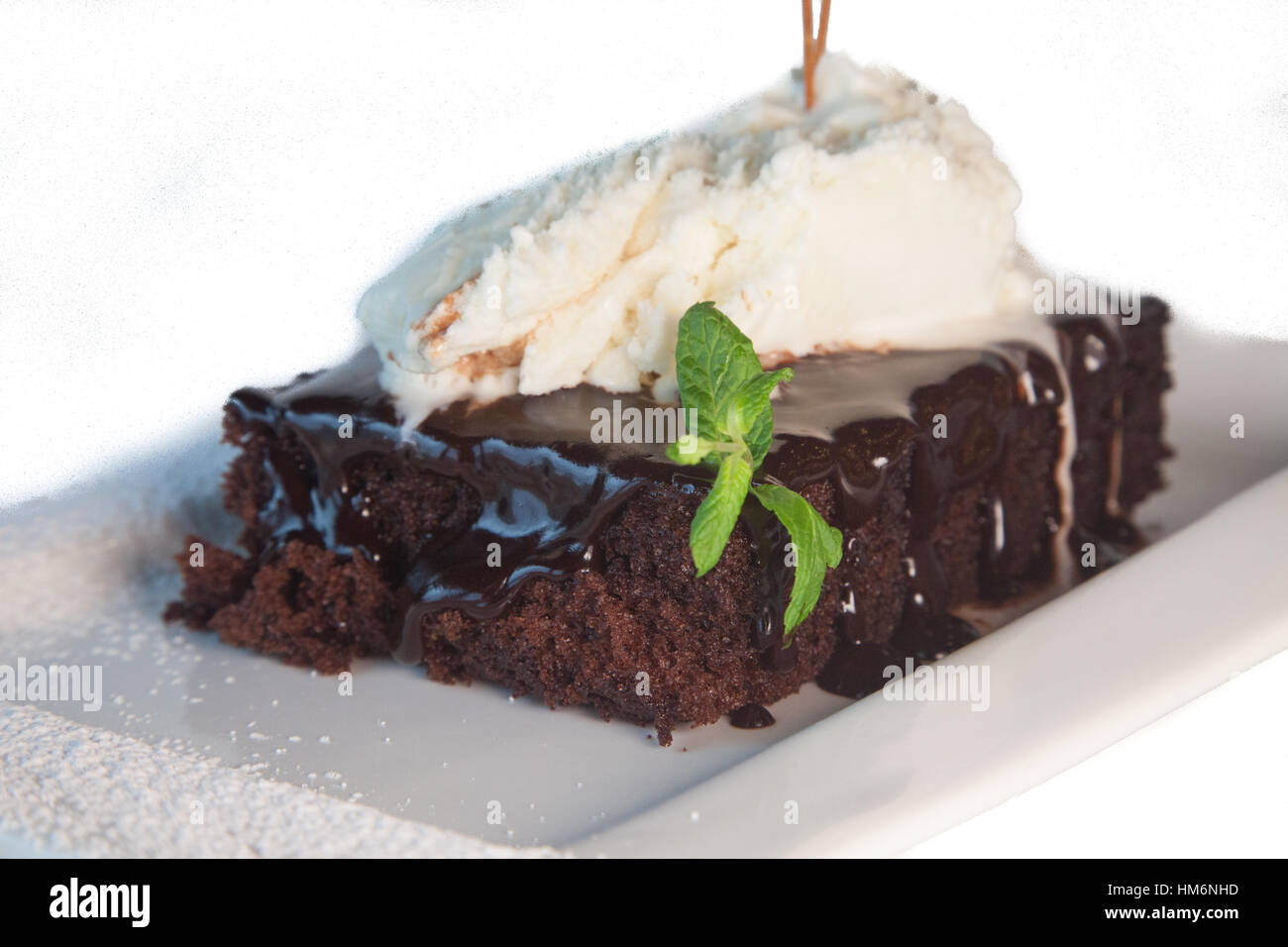 Chocolate pie with icecream isolated on white Stock Photo