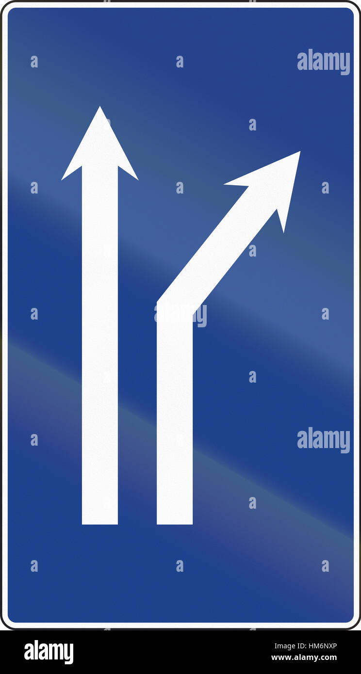 Road sign used in Spain Fork right onto dual carriageway Stock Photo Alamy