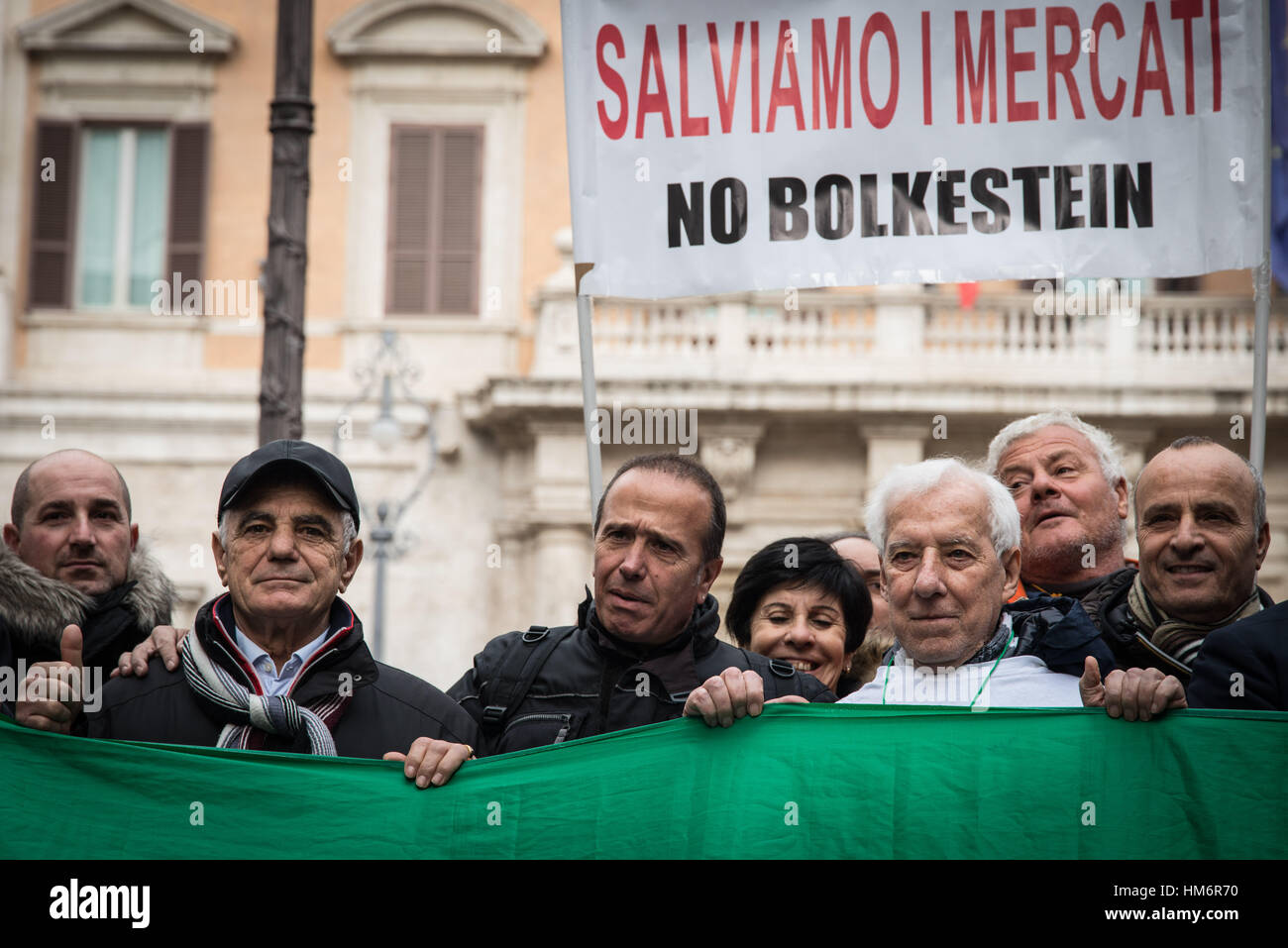 Rome, Italy. 31st Jan, 2017. Hundreds of street vendors take part in a rally in front of the Italian Chamber of Deputies to protest against the so-called Bolkenstein directive in Rome, Italy. The Bolkenstein directive from Dutch former EU internal Market Commissioner Frits Bolkenstein, is an EU law aiming at establishing a single market for services within the European Union. Credit: Andrea Ronchini/PacificPress/Alamy Live News Stock Photo