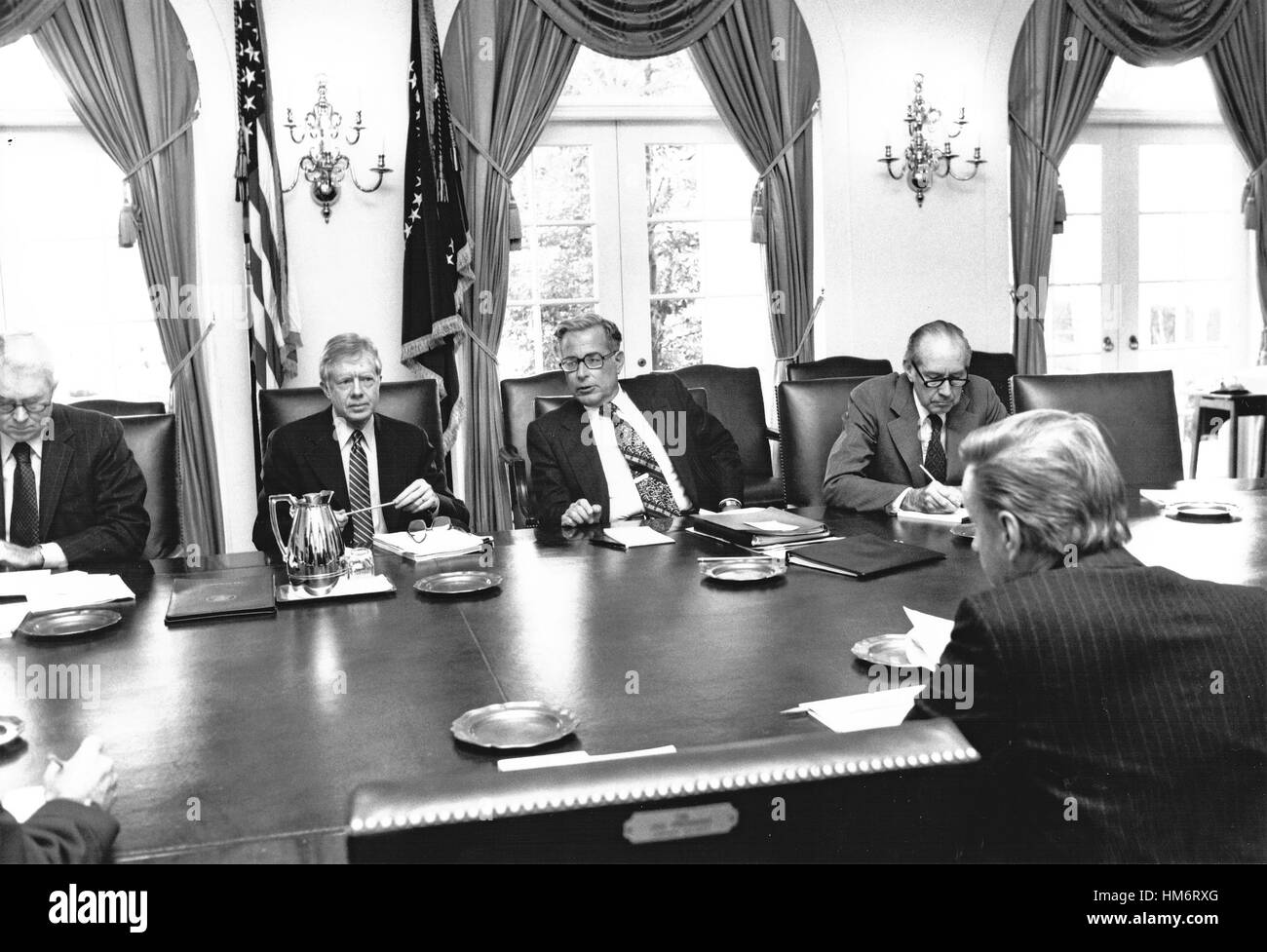 United States President Jimmy Carter returned from Camp David, the Presidential retreat near Thurmont, Maryland, to meet with his National Security Council concerning the crisis in Iran and the Soviet invasion of Afghanistan in the Cabinet Room of the Whi Stock Photo