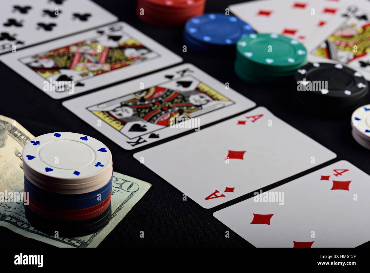 poker holdem game on black table with stake Stock Photo