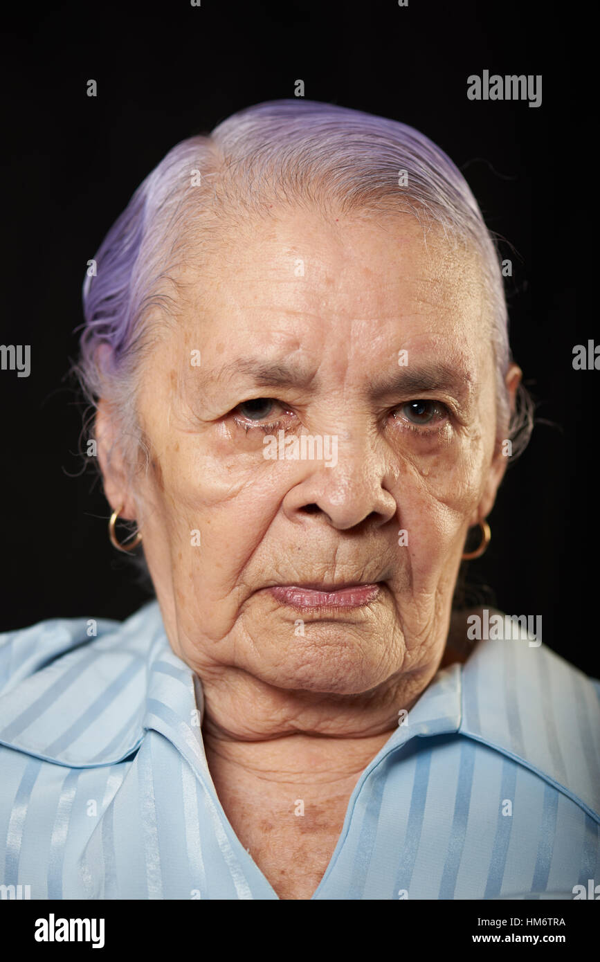 portrait of grandma isolated on black background Stock Photo