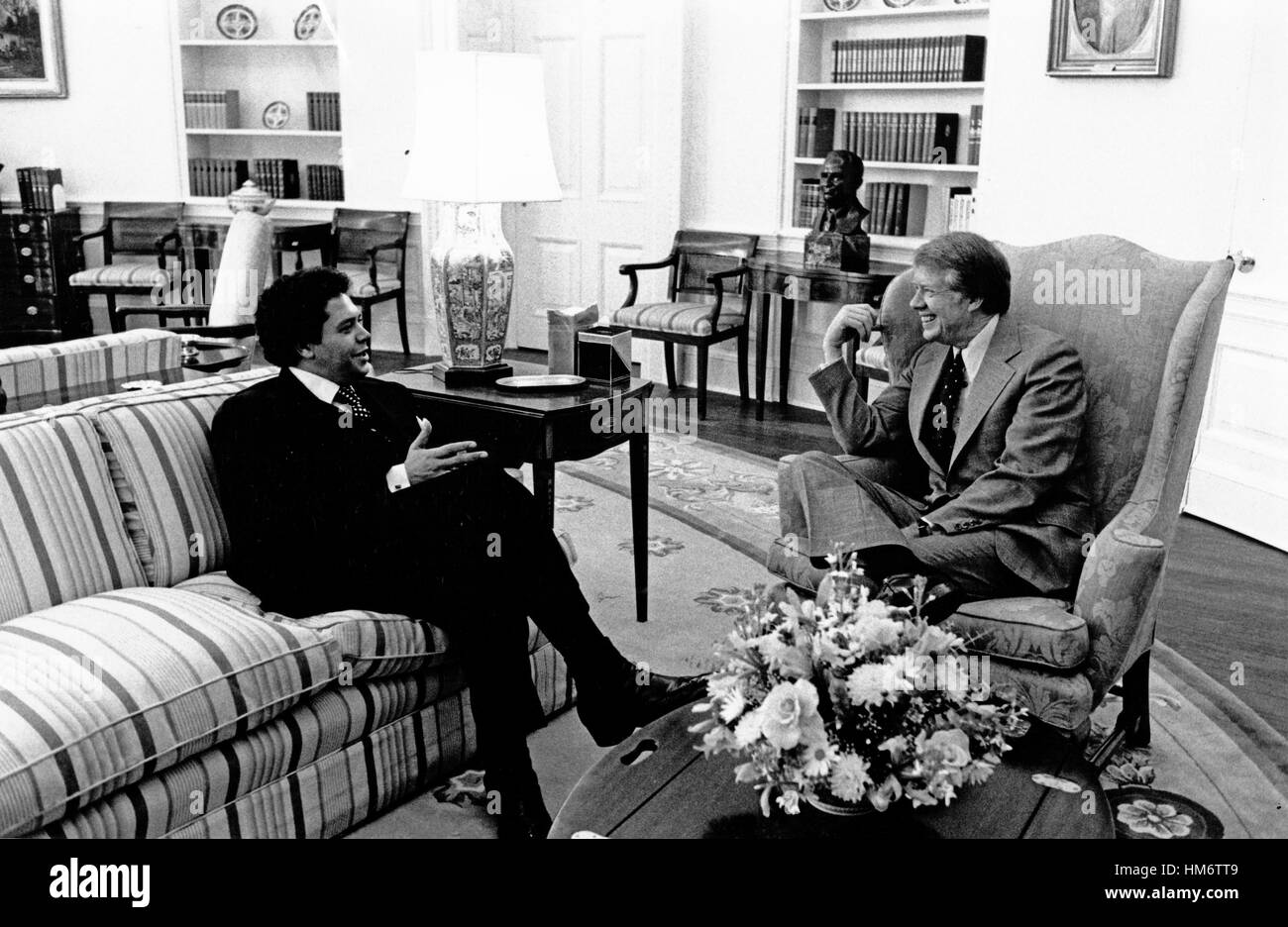 United States President Jimmy Carter, right, meets with Maynard Jackson (Democrat of Atlanta, Georgia) in the Oval Office of the White House in Washington, DC on February 1, 1977. Stock Photo