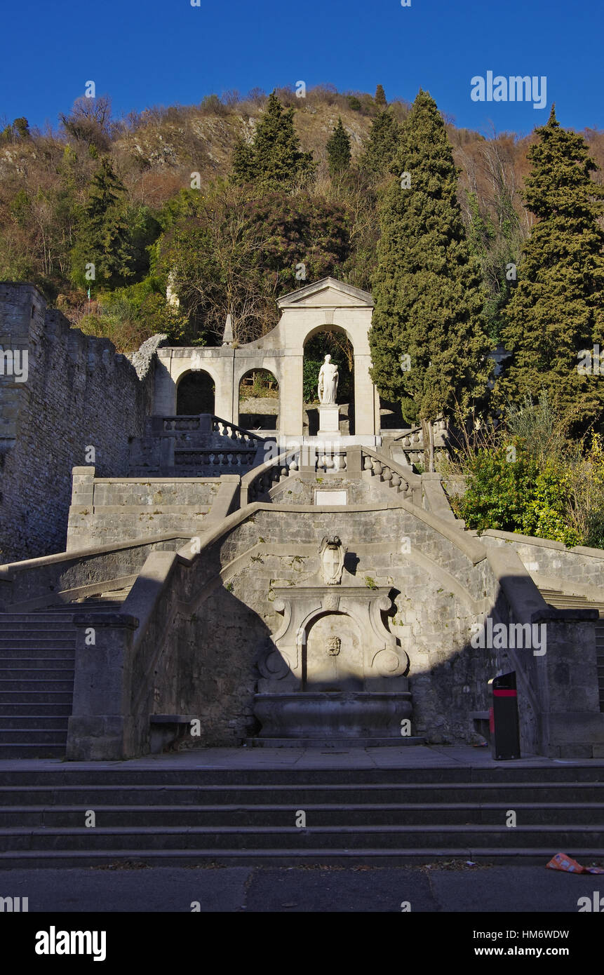 The stony stairs from Serravalle towards Santa Augusta's castle on the hill above the city. Stock Photo