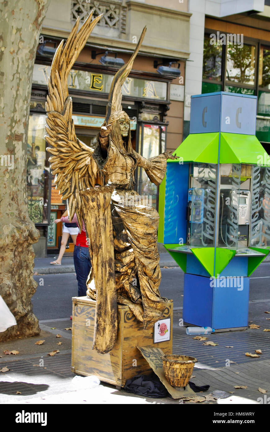 BARCELONA,ES - CIRCA JULY, 2008 - Performing artists exhibit along La Rambla, the famous street in Barcelona. Stock Photo