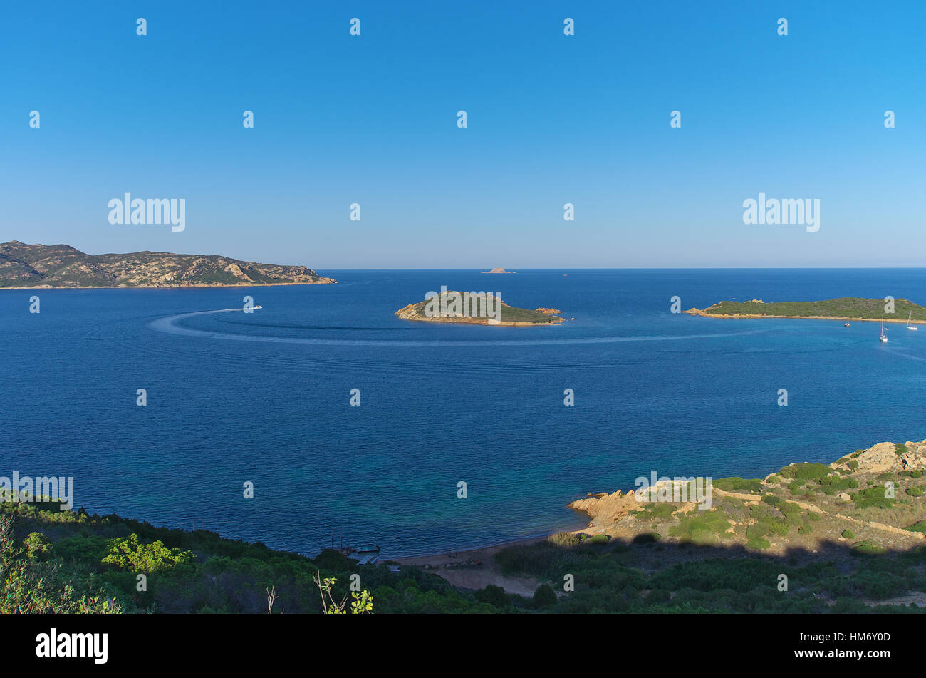 Capo Coda Cavallo bay at sunset Stock Photo Alamy