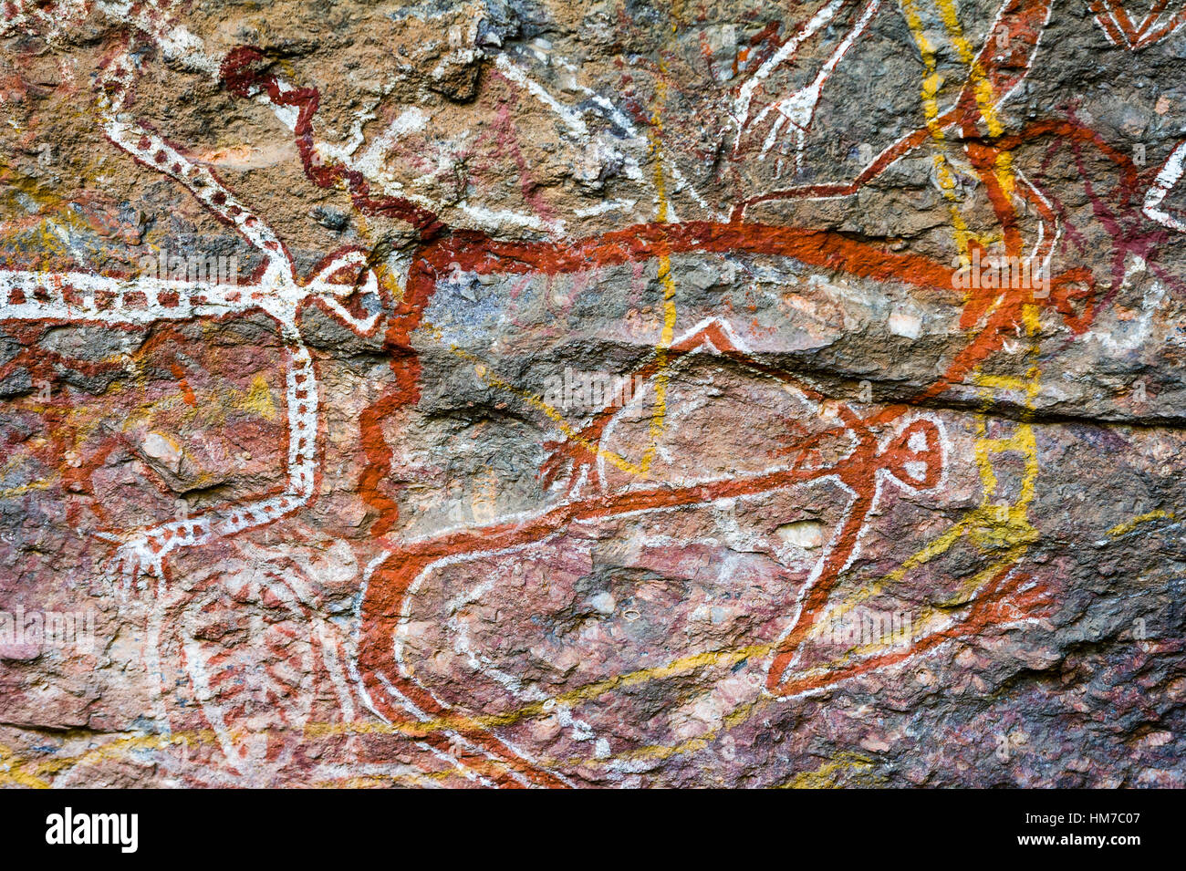 An Aboriginal rock painting art gallery featuring Mimi spirits which are fairy-like beings in Arnhem Land. Stock Photo