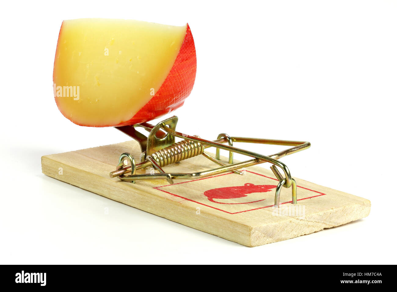 spring mousetrap with large piece of cheese isolated on white background Stock Photo