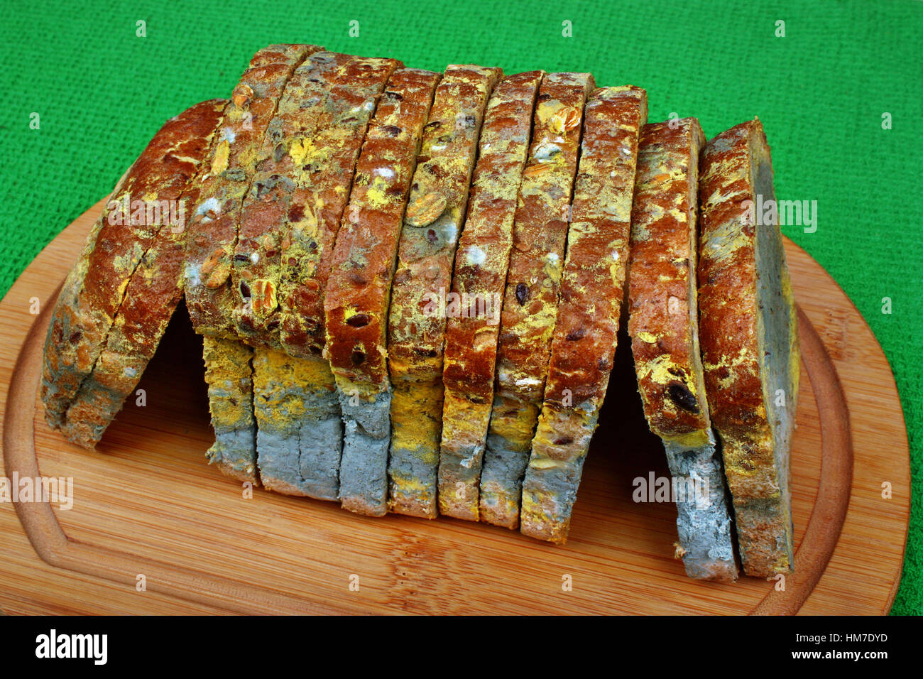 The old black mold on the bread, spoiled and mold food Stock Photo