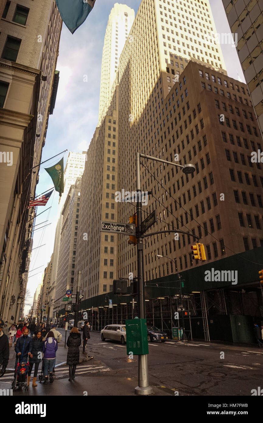 People walking along Broadway by Exchange Alley, New York Stock Photo