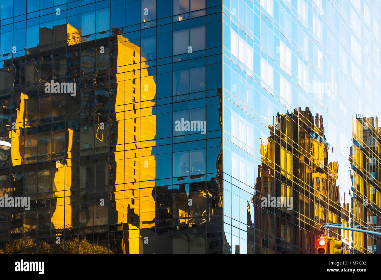 USA, New York, Glassy modern building in big city Stock Photo